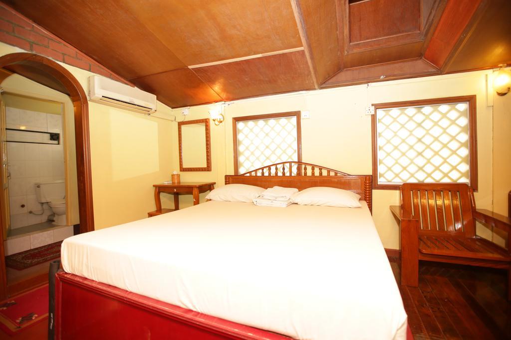 Okinawa Guest House Yangon Zimmer foto